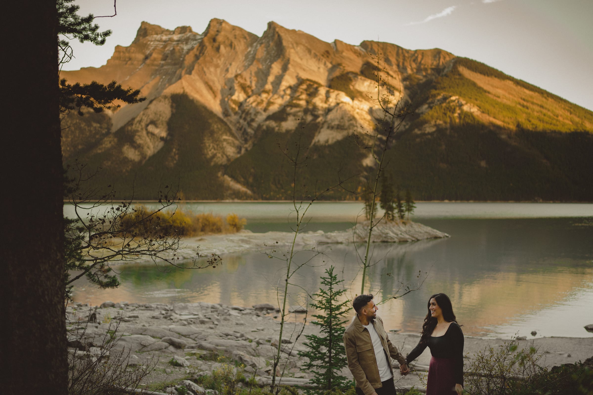 Engagement photography Edmonton — lake minnewanka romantic moment