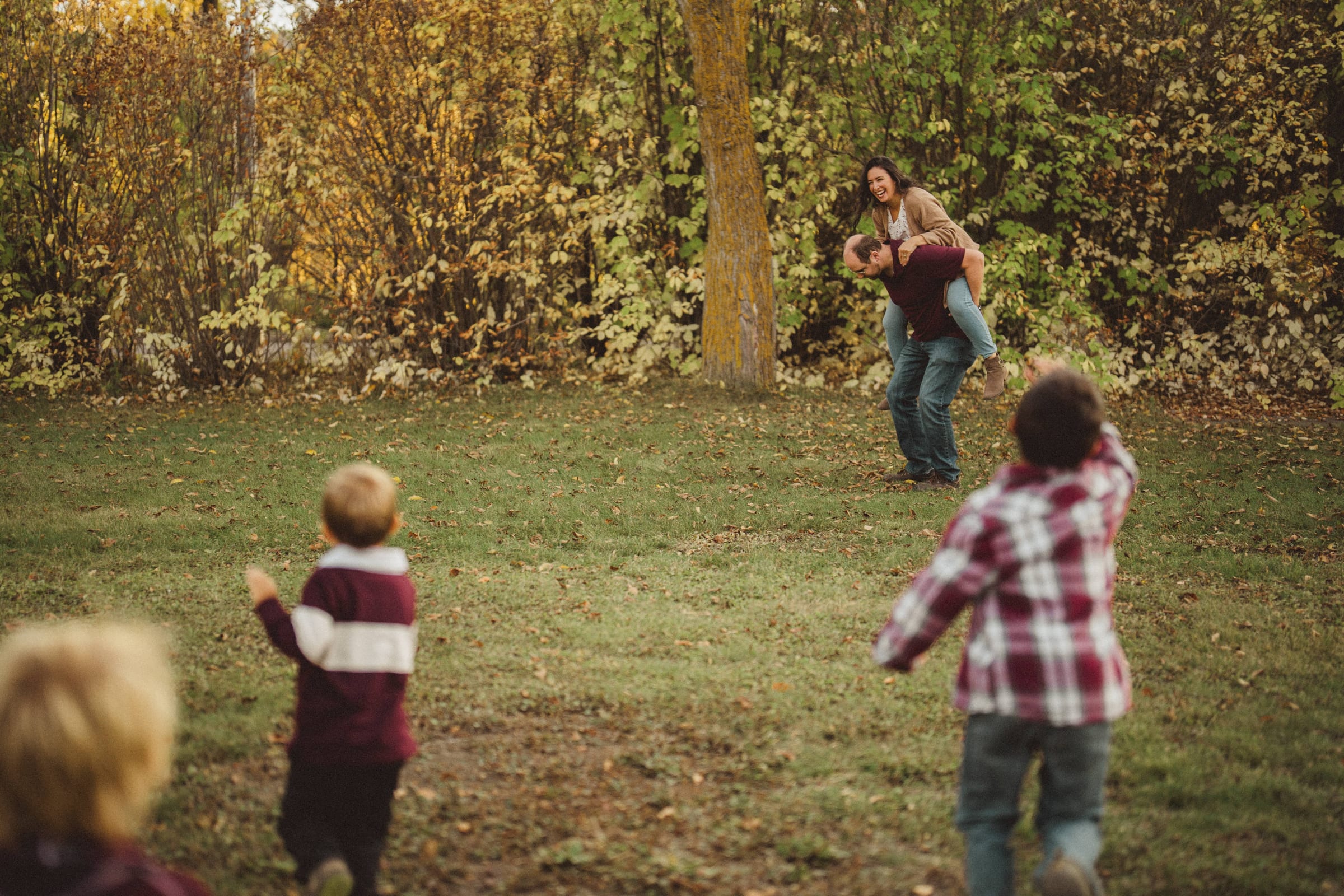 Family photography Edmonton — family laughing together